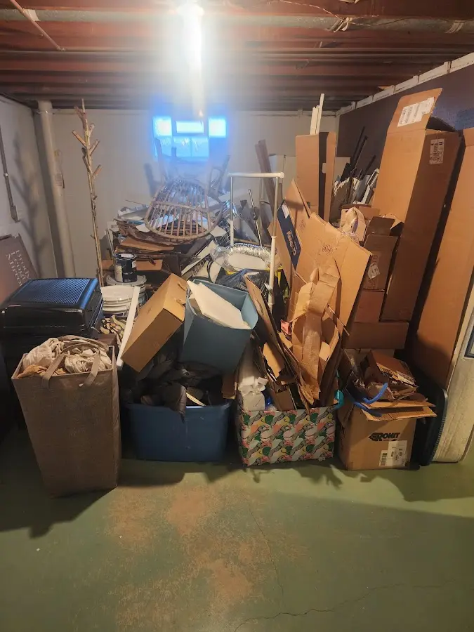 Roll-off dumpster container at job site for 20 Yard Dumpster Rental in Arden-Arcade